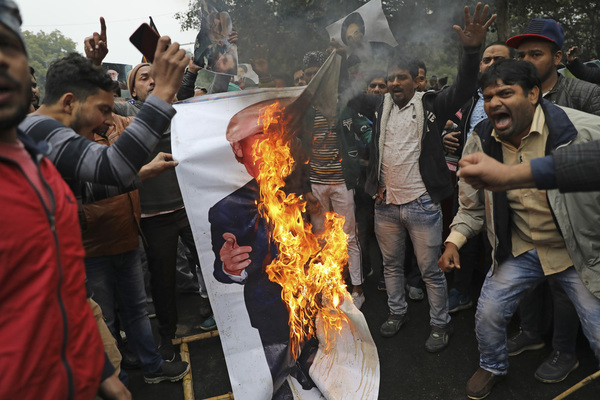 Images of Trump set alight in New Delhi as protests against Soleimani's killing held in multiple countries