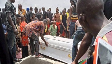 Tears as Delta community reburies exhumed bodies